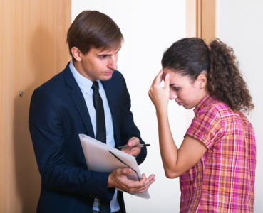 man collecting from woman